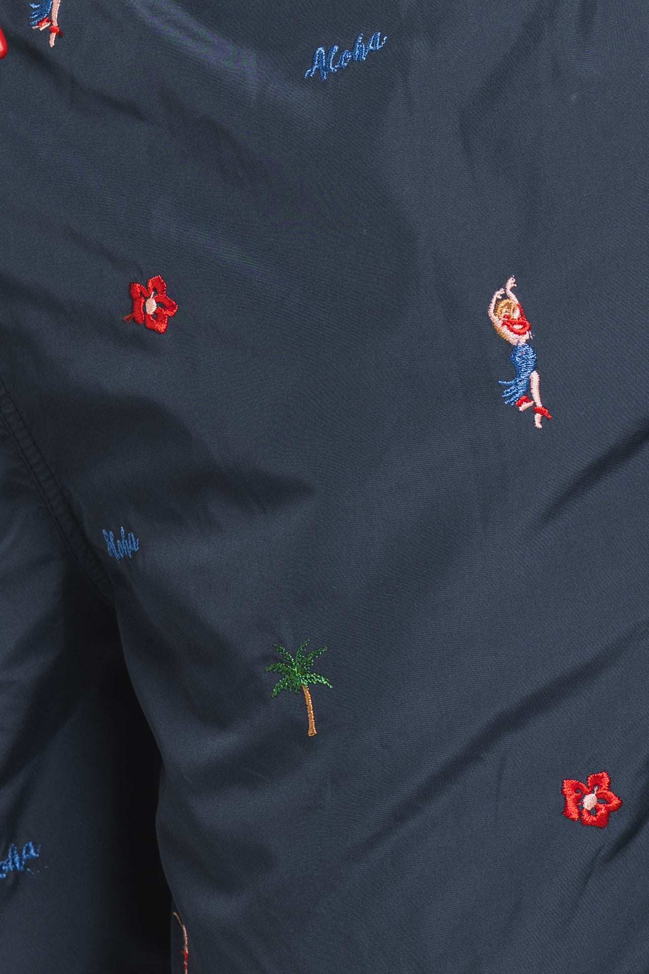 RIO ALOHA SWIM TRUNK IN PONJI WITH EMBROIDERY