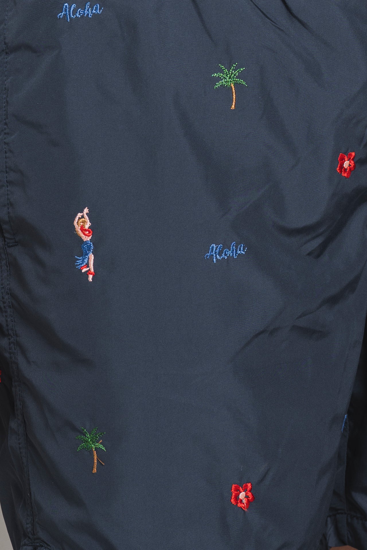 RIO ALOHA SWIM TRUNK IN PONJI WITH EMBROIDERY