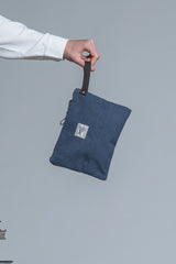 SOHO CLUTCH BAG IN CANVAS