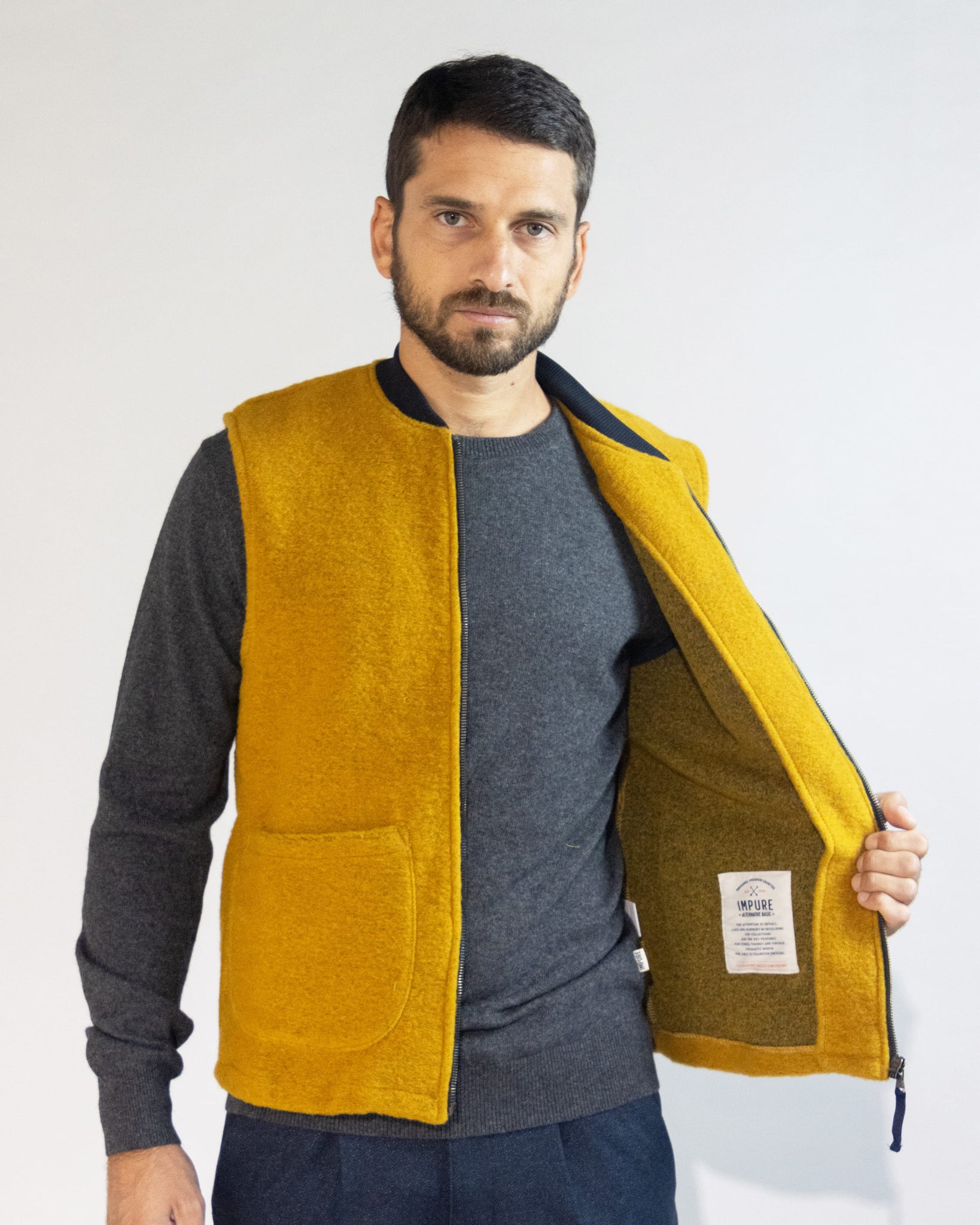 GILET MISTO LANA CON TASCONI